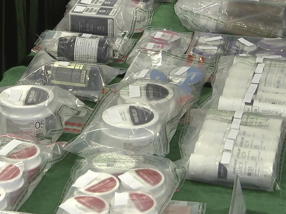 In this image made from a video, products containing CBD are displayed at a press conference by Hong Kong Customs in Hong Kong, Friday, Jan. 27, 2023.