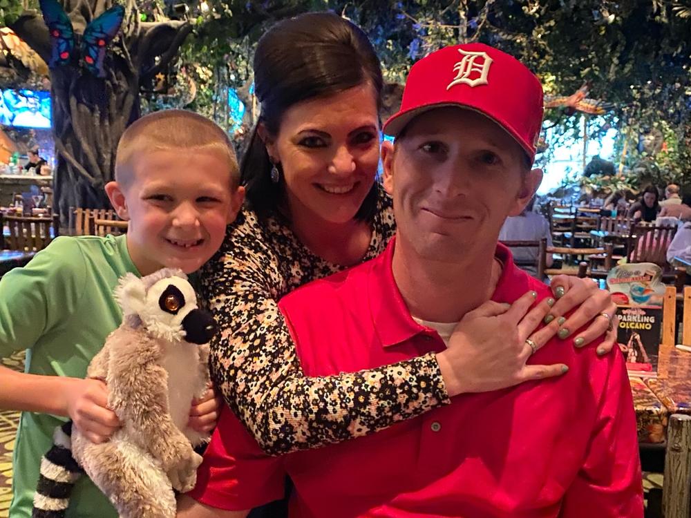 Betsy Cox with her husband, Steve, and their son, Blake.