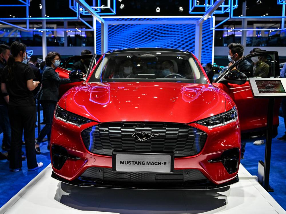 The Ford Mustang Mach-E is on display during the 19th Shanghai International Automobile Industry Exhibition in Shanghai on April 20, 2021. Ford cut the prices for the Mustang Mach-E this week in response to Tesla's price cuts.
