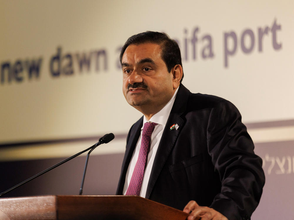 Gautam Adani, billionaire and chairman of Adani Group, speaks during an event at Israel's Port of Haifa, on Tuesday. The Indian billionaire, whose business empire was rocked by allegations of fraud by short seller Hindenburg Research, said his company will make more investments in Israel.