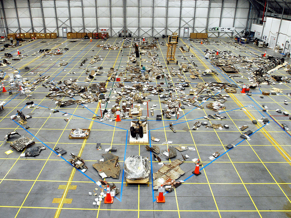 Columbia Space Shuttle debris covers the floor of the RLV Hangar Kennedy Space Center, Florida in May 2003.