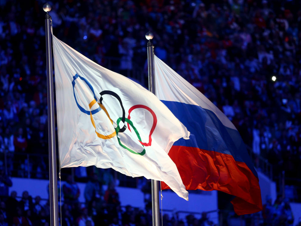 The Olympic flag and Russian flag seen during the Sochi Winter Olympics in 2014.