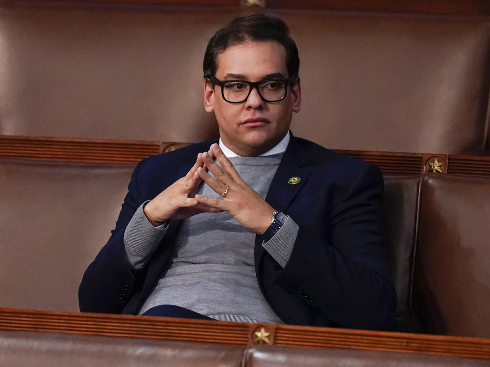 Rep. George Santos, R-N.Y., waits for the start of a session in the House chamber as the House meets for the fourth day to elect a speaker and convene the 118th Congress in Washington, D.C., Friday, Jan. 6.