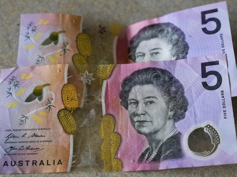 Australian $5 notes are pictured in Sydney on Sept. 10, 2022. King Charles III won't feature on Australia's new $5 bill, the nation's central bank announced Thursday, Feb. 2, 2023, signaling a phasing out of the British monarchy from Australian bank notes, although he is still expected to feature on coins.