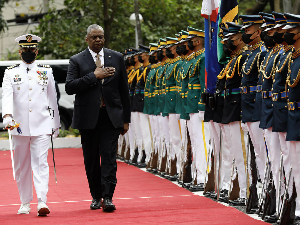 United States Defense Secretary Lloyd Austin walks past military guards during arrival honors at the Department of National Defense in Camp Aguinaldo military camp on Feb. 2, 2023 in Quezon City, Manila, Philippines.