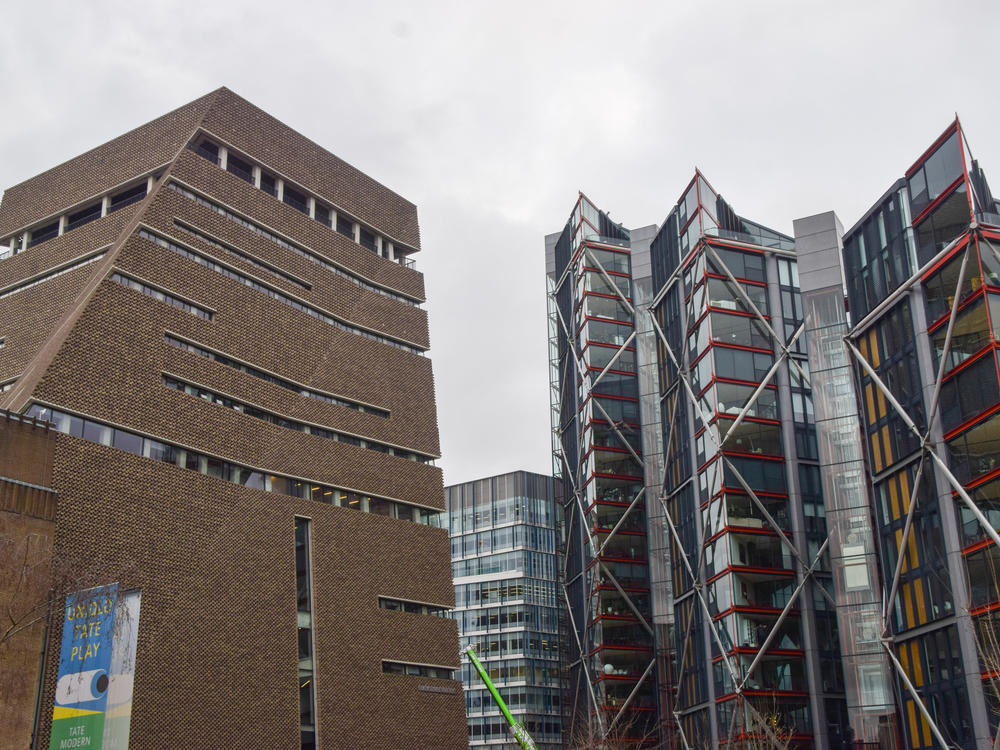Owners of apartments (seen at right) opposite Tate Modern have won a privacy case against the famous art gallery.