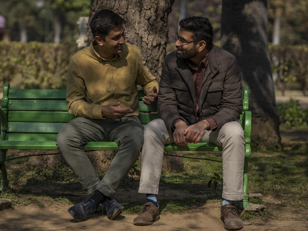 Indian couple Utkarsh Saxena, left, and Ananya Kotia, chat inside a public park in New Delhi, India, Jan. 18, 2023. The couple, now 15 years into their relationship, is joined by three other couples who have filed a petition to India's Supreme Court that seeks the legalization of same-sex marriage.