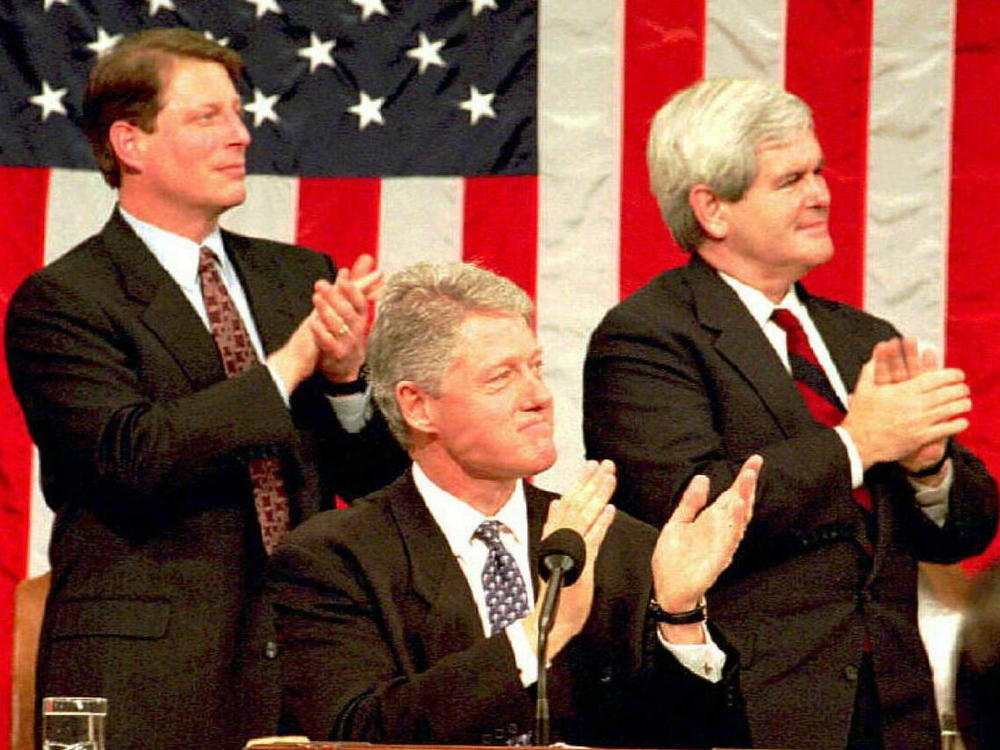 President Bill Clinton along with Vice President Al Gore  and Speaker Newt Gingrich applaud World War II veteran Jack Lucas during the 1995 State of the Union address.