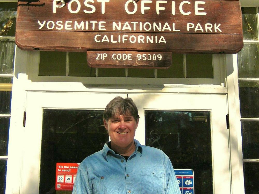 John Reynolds outside of the Post Office on Christmas, a regular part of his job.