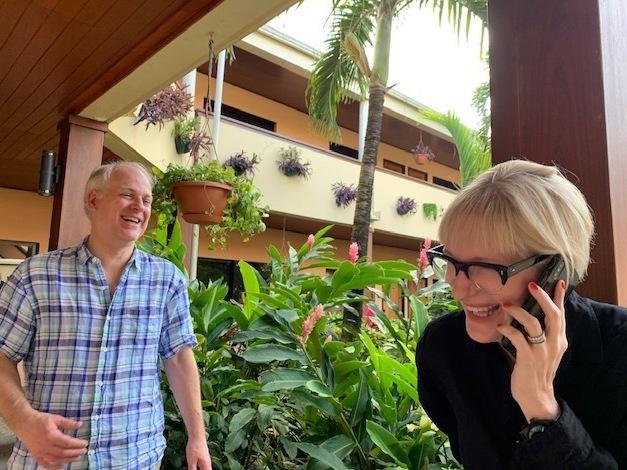 Wells Dixon, left, and Katya Jestin, who have represented Khan for more than a decade, speak with him by phone shortly after his release. Jestin criticized the U.S. operation at Guantánamo, calling it a 