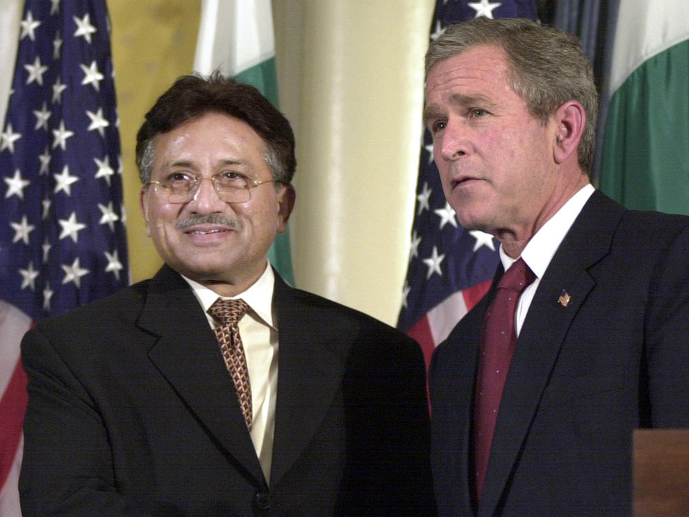 FILE - Then U.S. President Bush, right, shakes hands with then Pakistani leader Pervez Musharraf at a news conference at New York's Waldorf - Astoria Hotel, on Nov. 10, 2001.