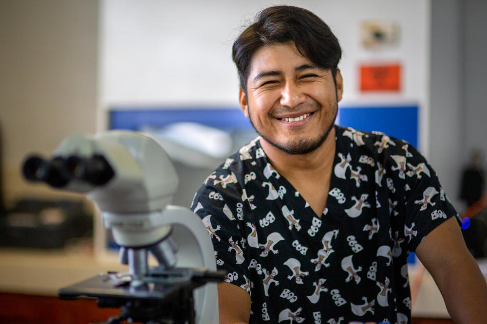 Anaya got his start at FunSalud transporting laboratory equipment. After a couple of promotions, he's now worked as a lab technician.