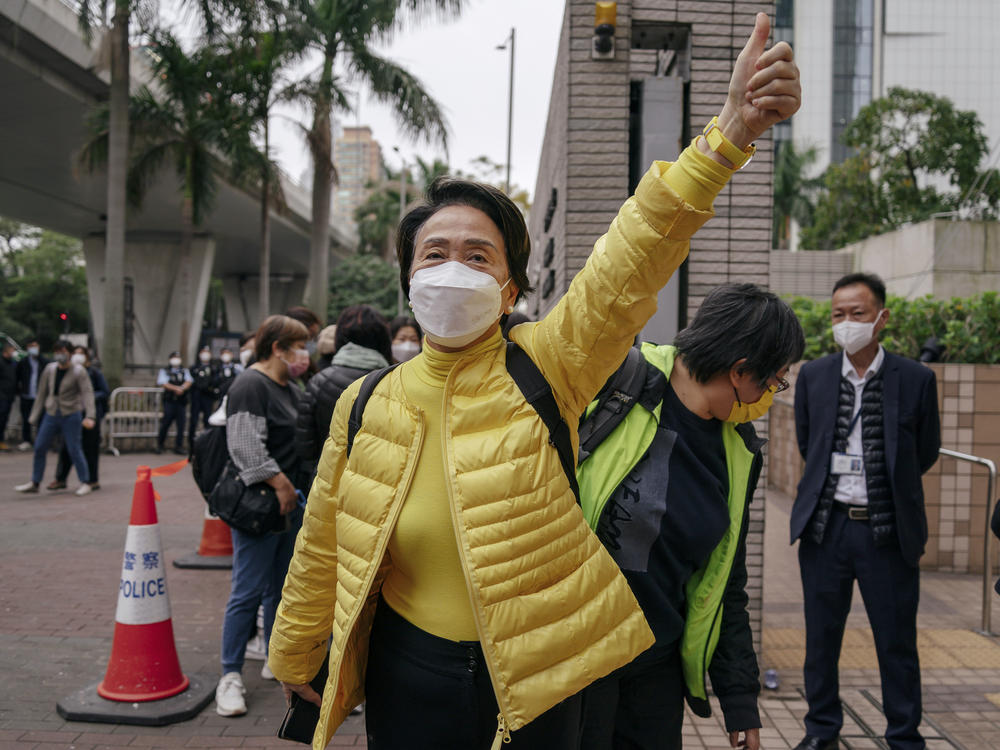 Pro-democracy activist Emily Lau Wai-hing gestures as she arrives at the West Kowloon Magistrates' Courts in Hong Kong, Monday, Feb. 6, 2023.