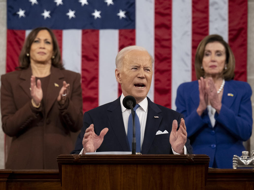 President Biden delivers the State of the Union address as U.S. Vice President Kamala Harris (L) and House Speaker Nancy Pelosi (D-CA) look on last March.