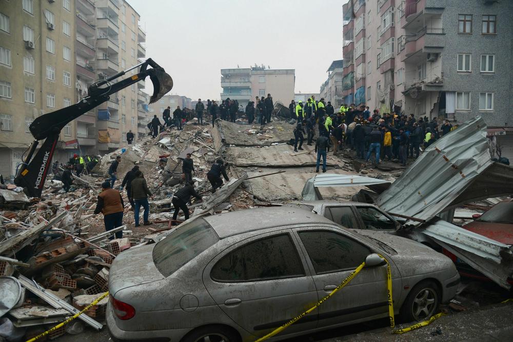 People search for survivors in Diyarbakir, Turkey, on Monday, after a 7.8-magnitude earthquake struck the country's south-east.