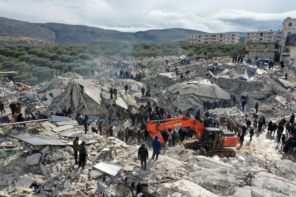 Residents and rescue teams searching for survivors in the rubble of collapsed buildings in the aftermath of Monday's earthquake.