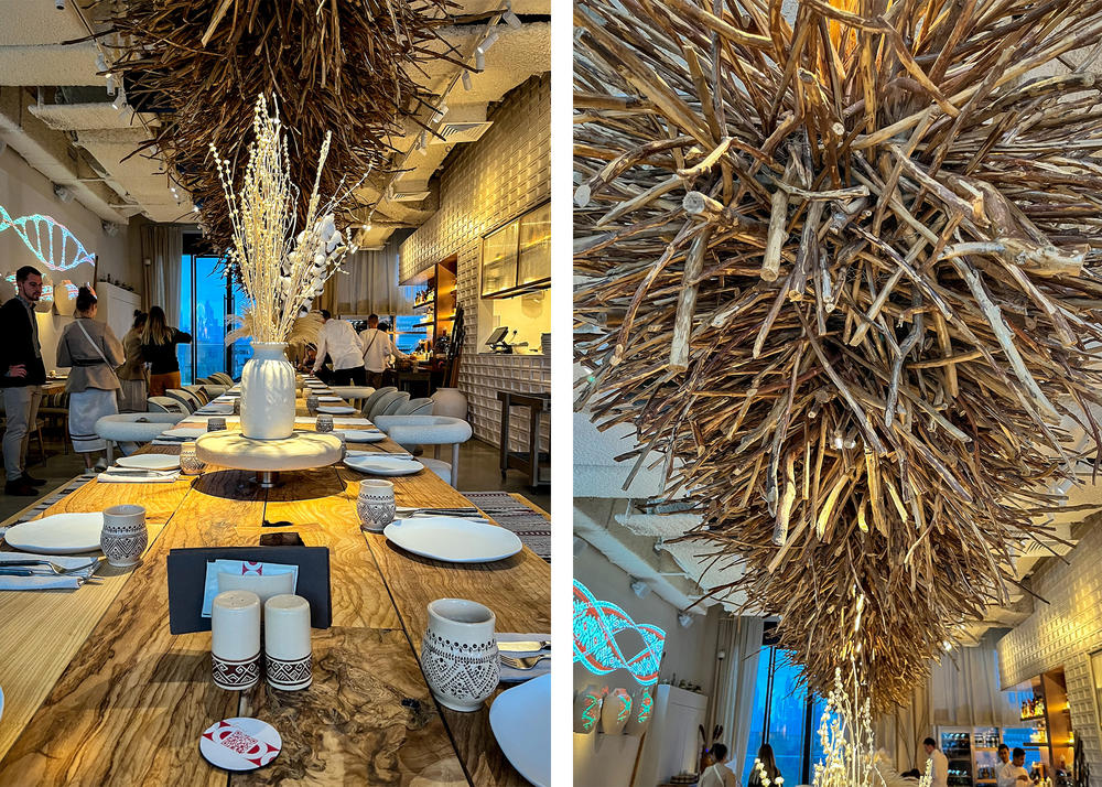 (Left) Yoy's 42-foot-long wooden table is meant to mimic dinners in the Ukrainian countryside, where neighbors gather to break bread and share meals. (Right) The chandelier is intended to replicate the look of a stork's nest. The bird represents new life and springtime in Ukraine.