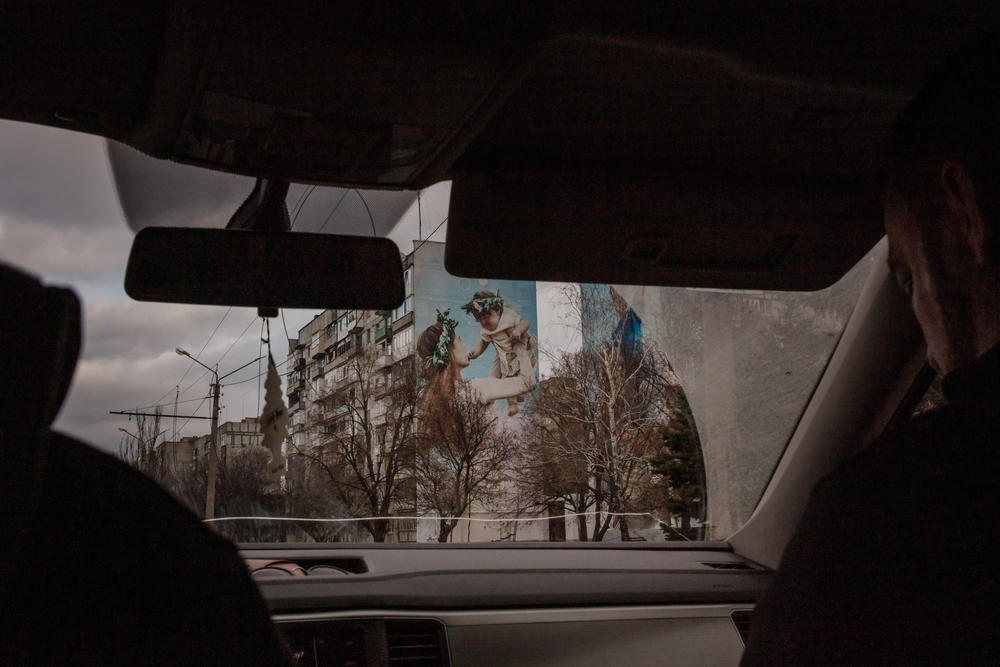 The view of the road into Bakhmut, where many buildings have been damaged by heavy shelling.