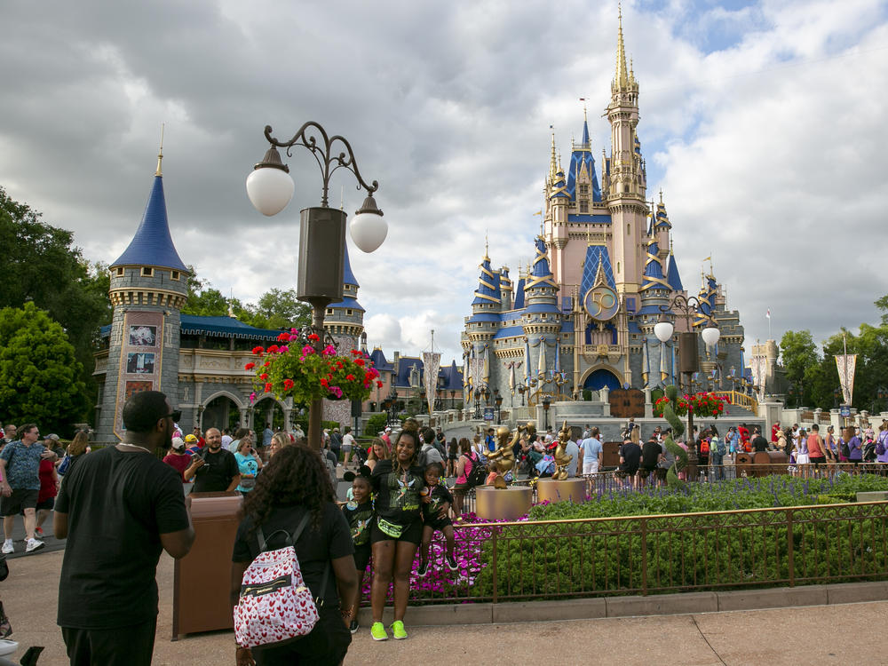 People visit Magic Kingdom Park at Walt Disney World Resort in Lake Buena Vista, Florida, on Friday, April 22, 2022.