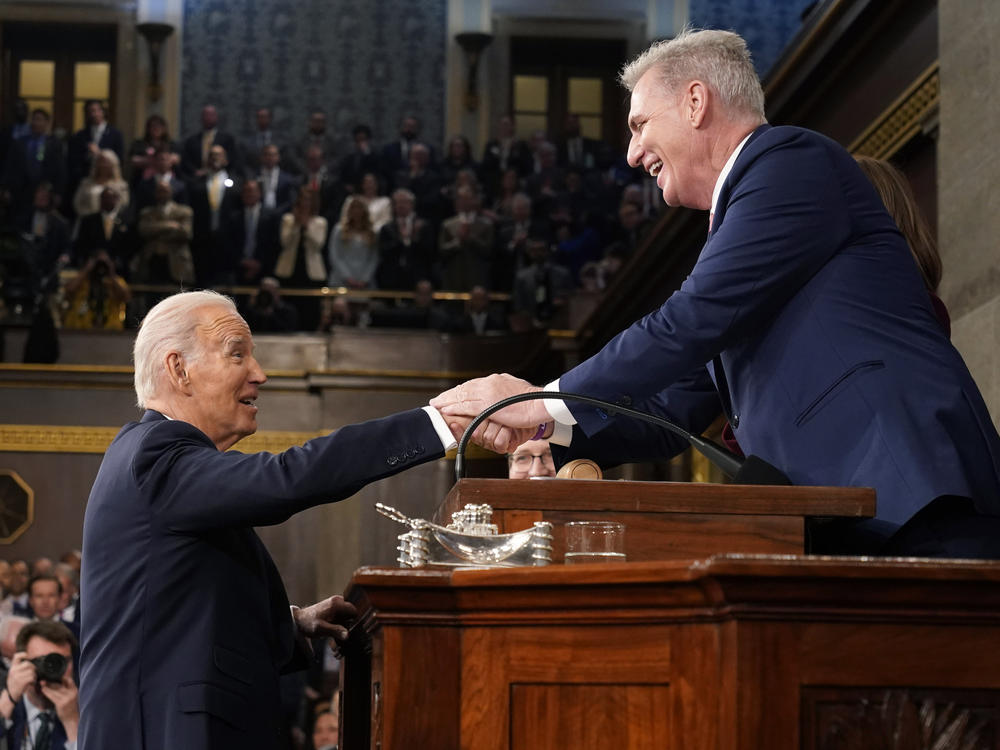 President Biden shakes hands with House Speaker Kevin McCarthy before delivering the State of the Union address