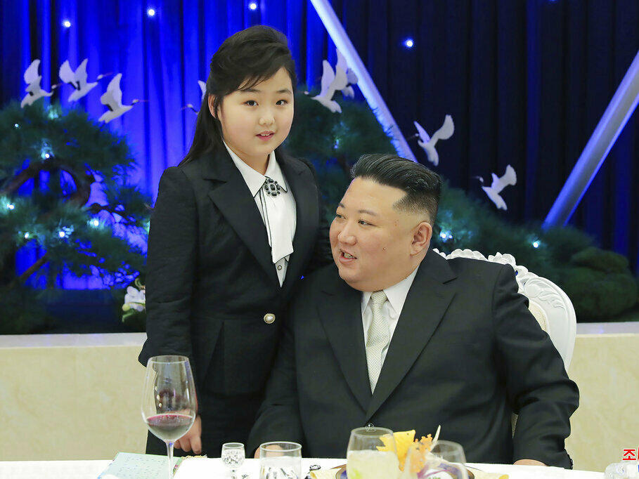 North Korean leader Kim Jong Un and his daughter attend a feast to mark the 75th founding anniversary of the Korean People's Army.