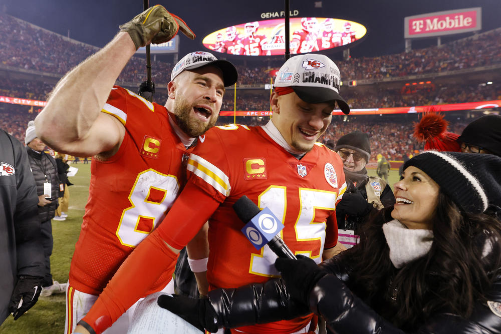 Tight end Travis Kelce, #87, and quarterback Patrick Mahomes, #15, celebrate after their Kansas City Chiefs won the AFC title game.