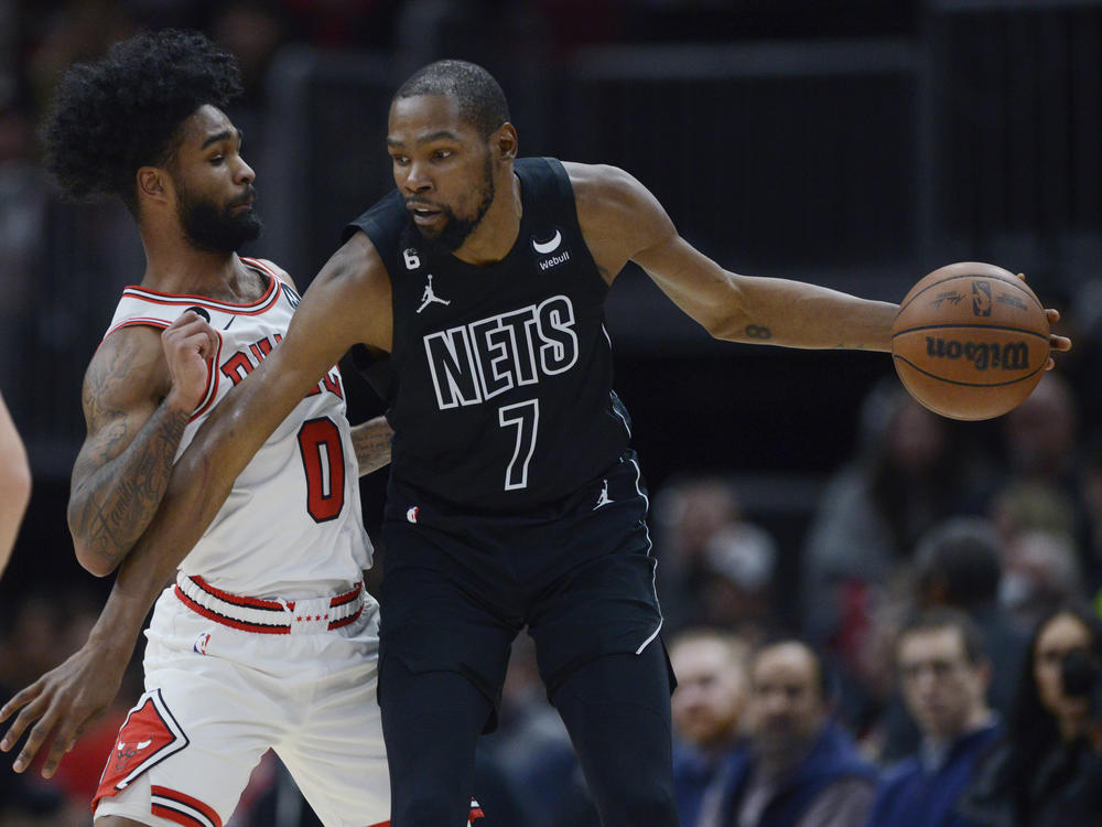 The Brooklyn Nets' Kevin Durant (right) looks to drive against the Chicago Bulls' Coby White during a Jan. 4 game in Chicago.