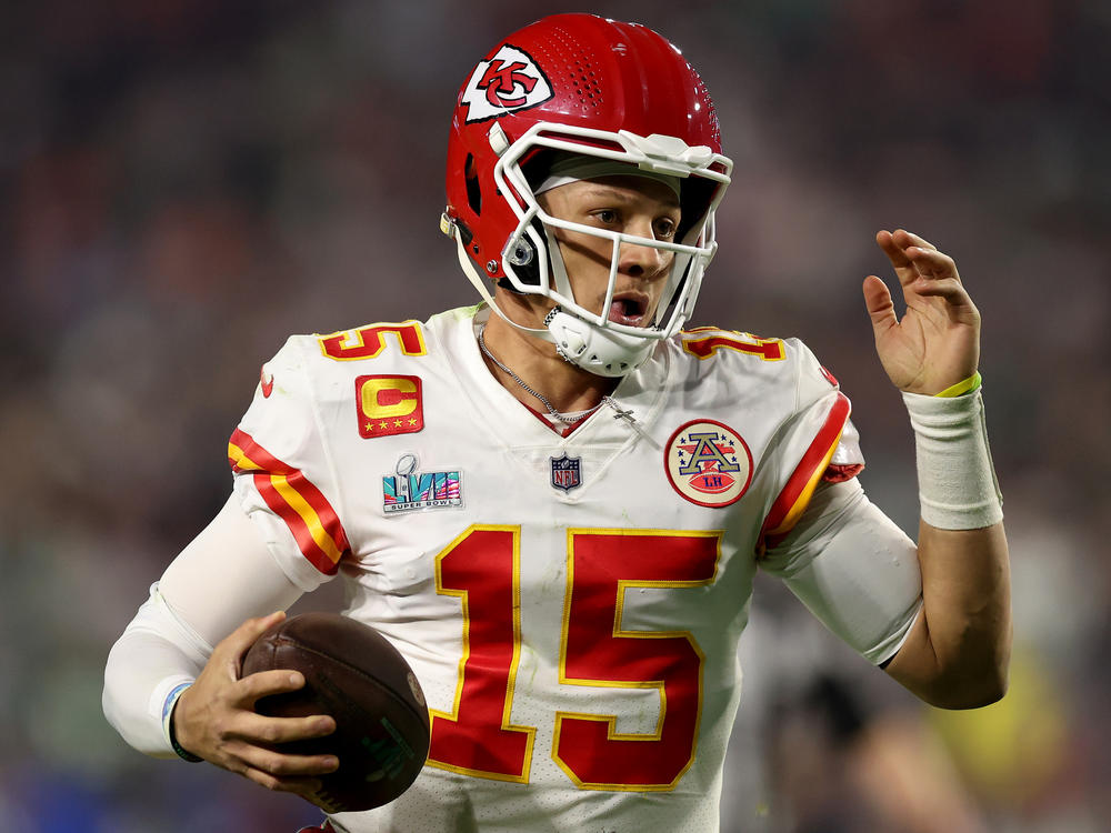 Quarterback Patrick Mahomes of the Kansas City Chiefs scrambles against the Philadelphia Eagles during the third quarter in Super Bowl LVII at State Farm Stadium on February 12, 2023 in Glendale, Ariz.