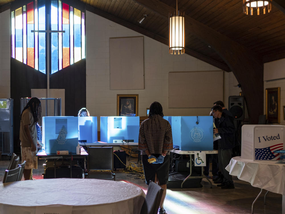 Voters mark their ballots for the midterm election Nov. 8, 2022, at Lawrenceville Road United Methodist Church in Tucker, Ga.