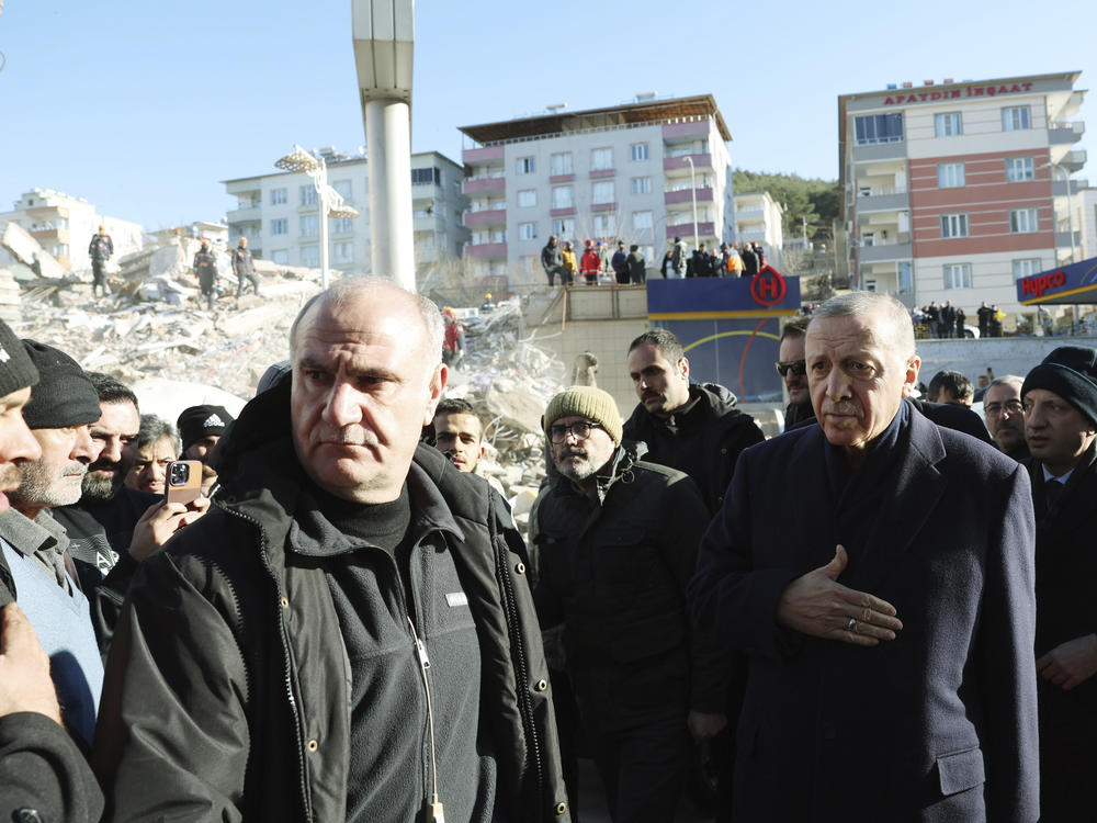 Turkey's President Recep Tayyip Erdogan visits the city center destroyed by last the Feb. 6 earthquake in Kahramanmaras, southern Turkey, on Feb. 8.