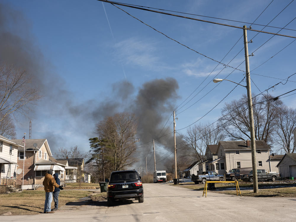 Smoke rises from a derailed cargo train in East Palestine, Ohio, on Feb. 4.