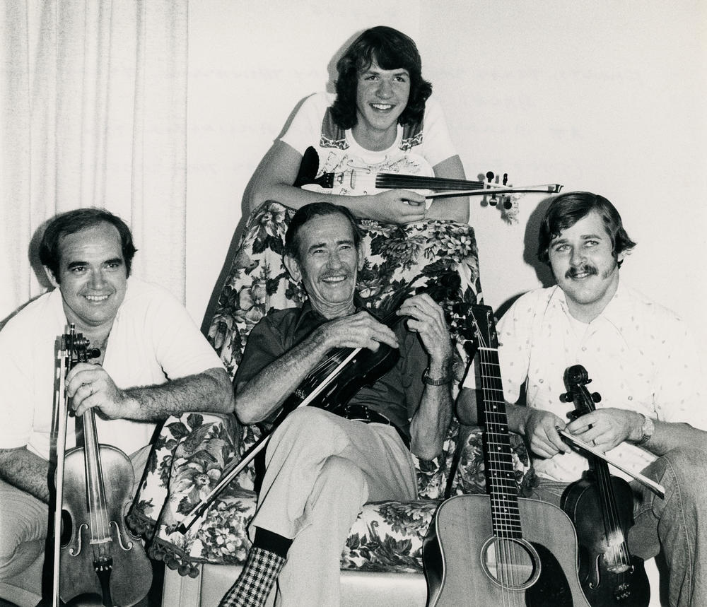A 14-year-old O'Connor (top) poses with fellow world champion fiddlers (L to R) Jim Chancellor, Benny Thomasson and Terry Morris