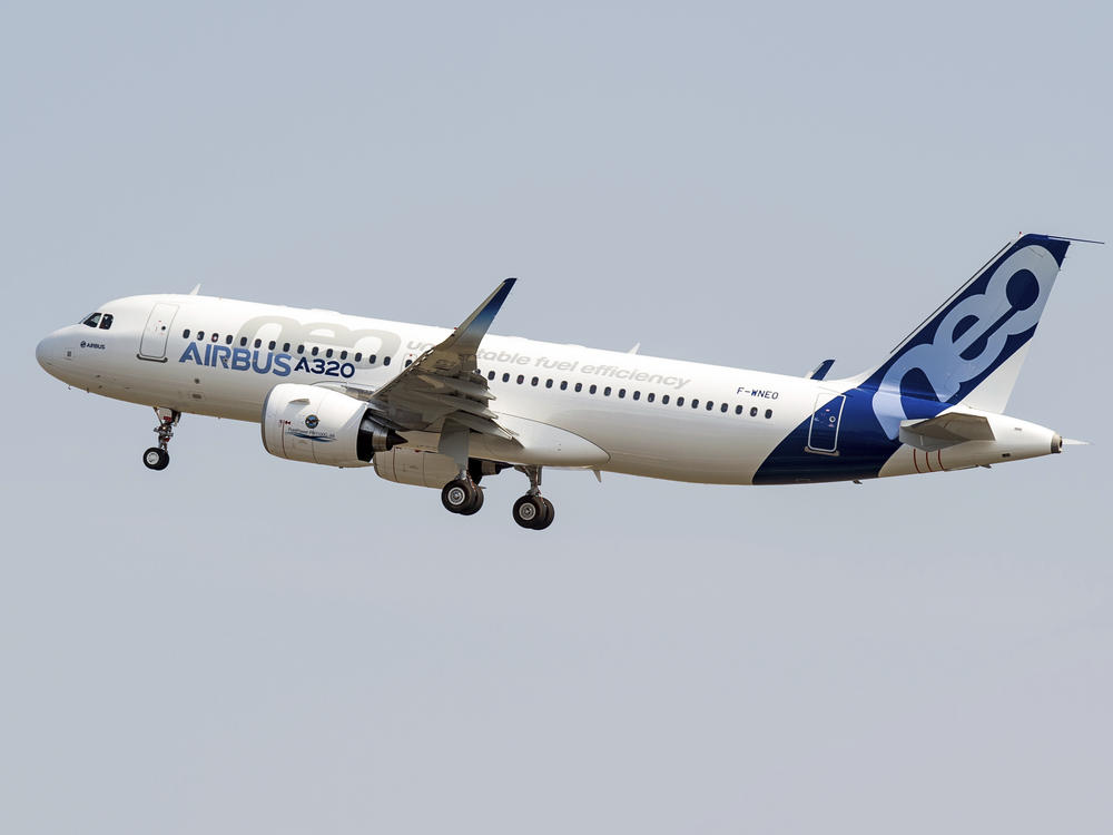 The new Airbus A320neo takes off for its first test flight at Toulouse-Blagnac airport in southwestern France on Sept. 25, 2014. The owner of Air India announced a deal Tuesday to buy 250 Airbus jets, including A350 wide-body planes and A320neo single-aisle planes in a deal worth billions of dollars.
