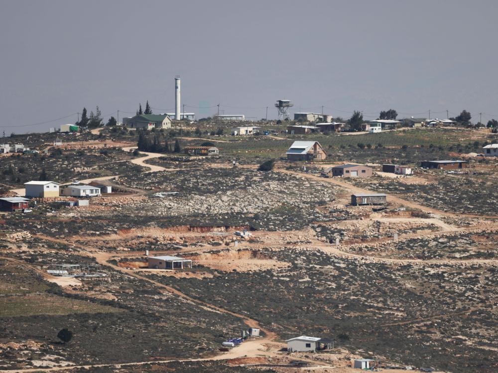 A picture taken from the Palestinian village of Aqraba shows the Israeli settlement outpost of Gevat Arnon, near Nablus city in the southern occupied West Bank.