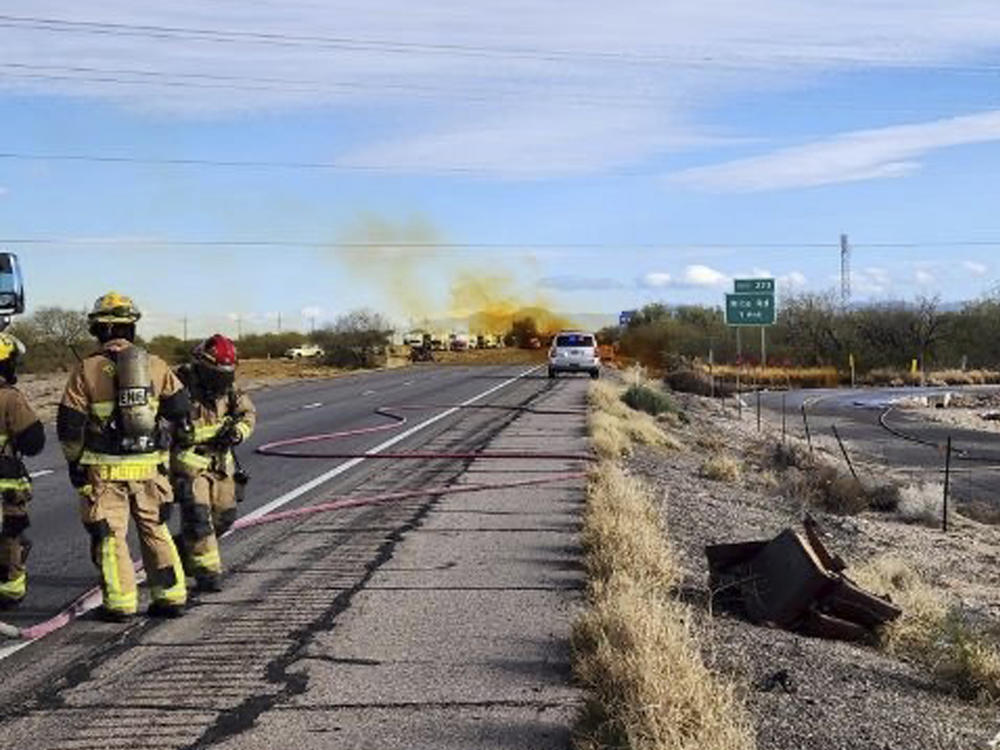 An accident involving a commercial tanker truck caused a hazardous material to leak onto Interstate 10 outside Tucson, Ariz., on Tuesday, prompting state troopers to shut down traffic on the freeway.