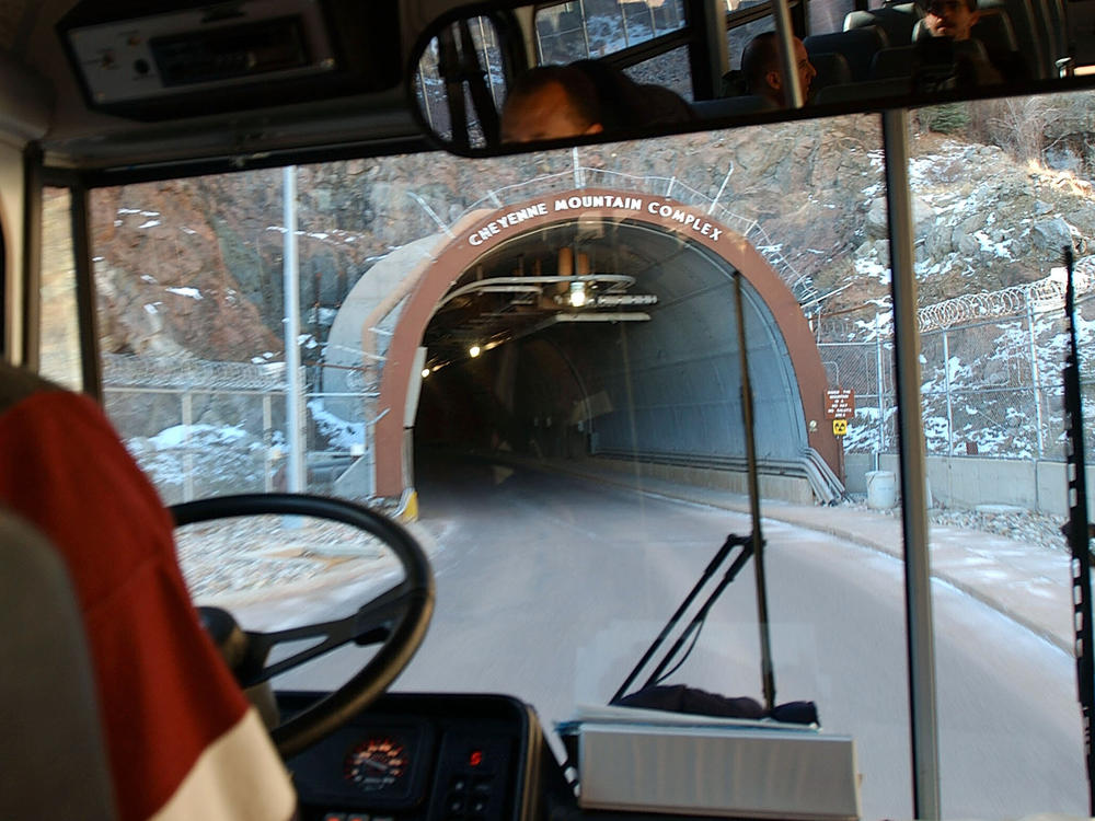 For years, North American Aerospace Command — or NORAD — had its headquarters inside Cheyenne Mountain, at the foot of the Rocky Mountains in Colorado. In this archival photo, a bus enters a tunnel for a half-mile trip to a command center inside the Cheyenne complex. The headquarters is now in nearby Colorado Springs.