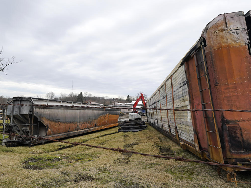 Some of the railcars that derailed Friday night when a Norfolk Southern freight train derailed are in the process of being cleaned up on Thursday, Feb. 9, 2023 in East Palestine, Ohio.