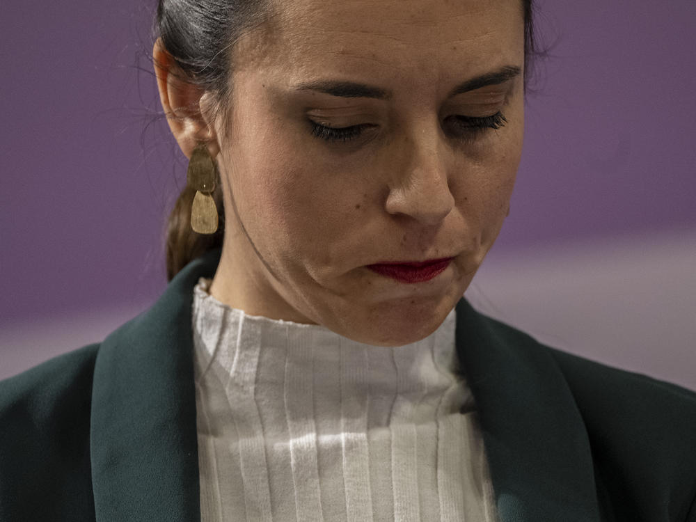 Spain's Equality Minister Irene Montero looks down during a press conference in Madrid on Jan. 27. Spain's parliament passed laws on Thursday expanding abortion and transgender rights for teenagers, while making Spain the first country in Europe entitling workers to paid menstrual leave.