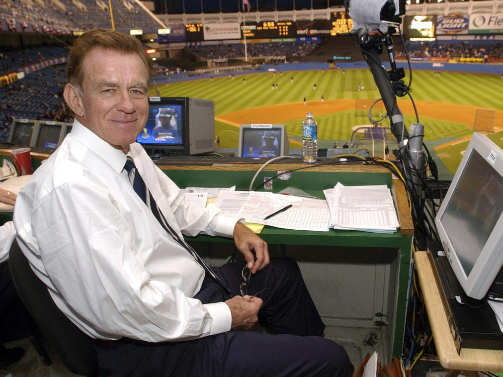Baseball announcer Tim McCarver poses in the press box before the start of Game 2 of the American League Division Series on Oct. 2, 2003, in New York. The All-Star catcher and Hall of Fame broadcaster died Thursday at age 81.