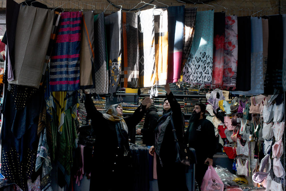 Women shop for head scarves at the Grand Bazaar.