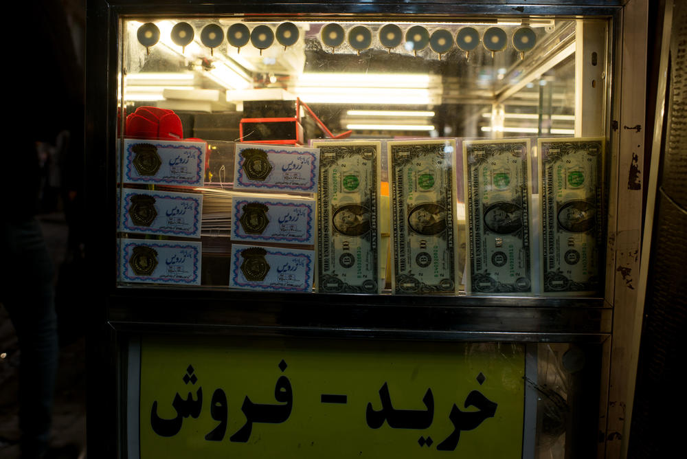 At a small gold and currency trader at the Grand Bazaar in Tehran, the Farsi sign reads: 