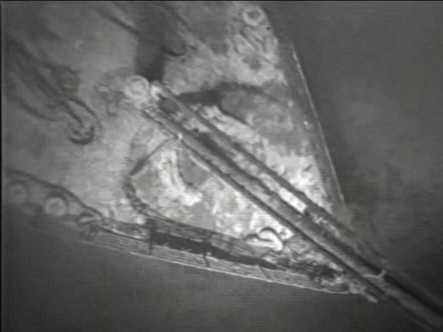 In this screenshot captured by NPR, the bow of the shipwrecked Titanic is seen from the first human-operated vehicle to visit the site in 1986. The Woods Hole Oceanographic Institution released footage from that 1986 dive on Wednesday.