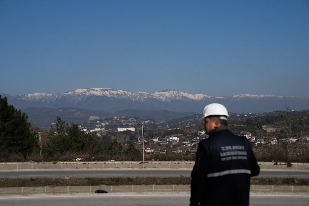 Yasin Pinarbasi is one of hundreds of Turkish engineers who've volunteered to inspect buildings in the sprawling quake zone. He's working on an area west of Antakya, Turkey.
