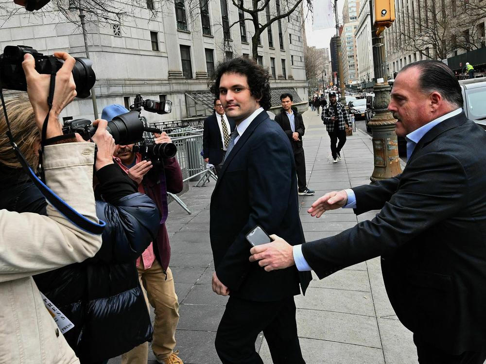 FTX founder Sam Bankman-Fried arrives at the U.S. Federal Court in New York for a hearing on Feb. 16, 2023. As he awaits trial, the disgraced former CEO is defending himself in the court of public opinion.