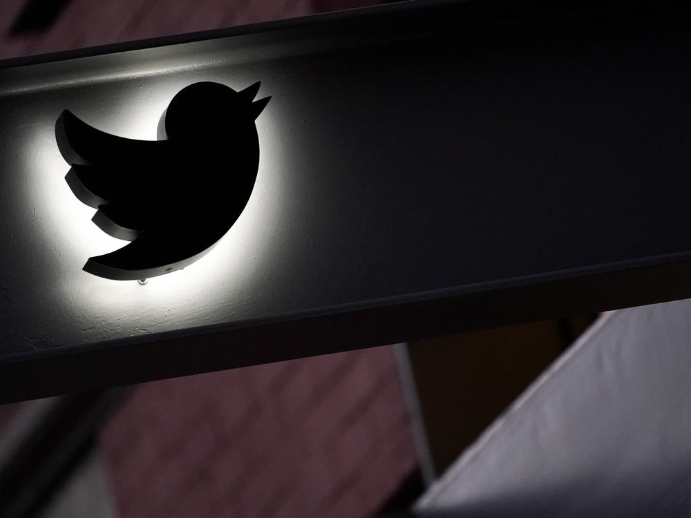 The Twitter logo is seen on the awning of the building that houses the Twitter office in New York on Oct. 26, 2022.