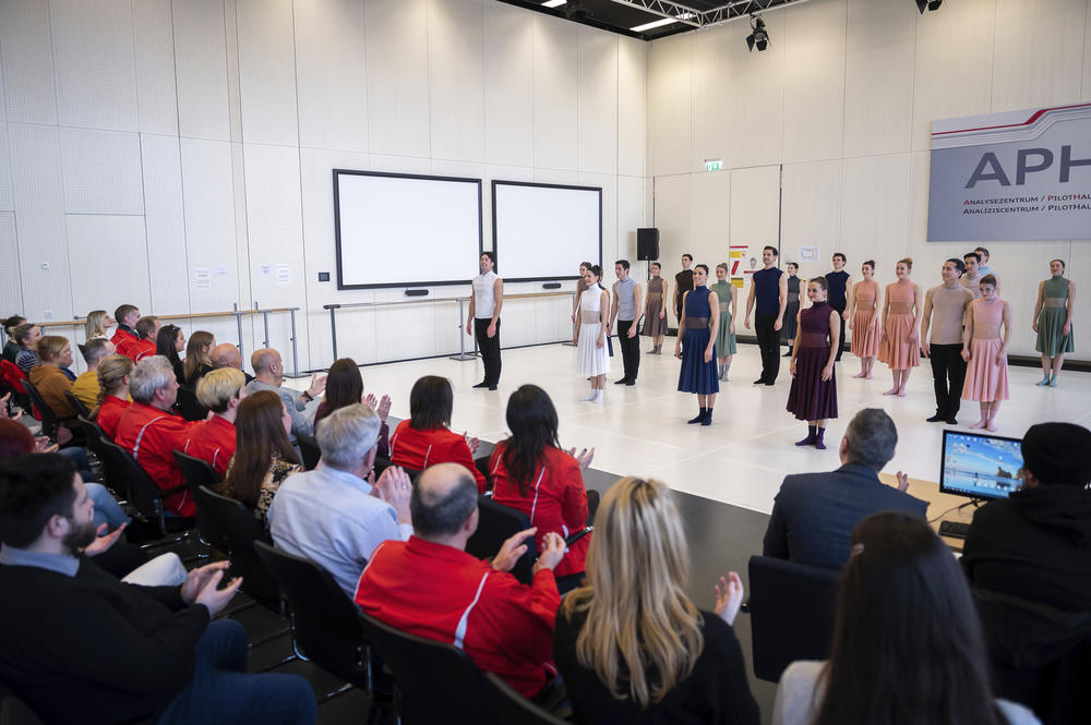 Audi workers applaud ballet dancers during an open rehearsal at the factory on Thursday.