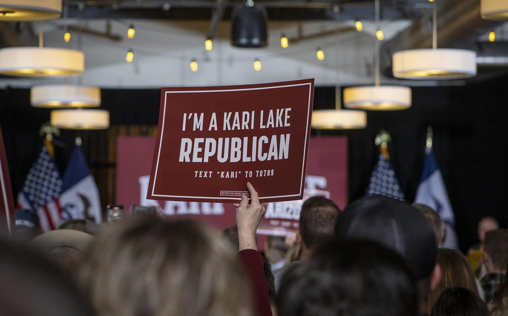Former Republican Arizona gubernatorial candidate Kari Lake speaks to potential Iowa caucusgoers at a rally in Ankeny, Iowa on Feb. 11, 2023. Lake is a native of Iowa and told Iowans to ask candidates where they stand on 