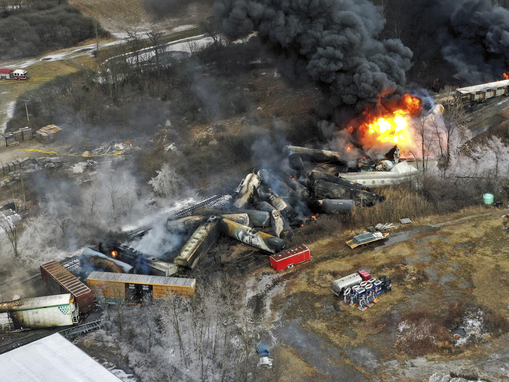 This photo taken with a drone shows portions of a Norfolk Southern freight train that derailed Feb. 3 in East Palestine, Ohio were still on fire on Feb. 4.