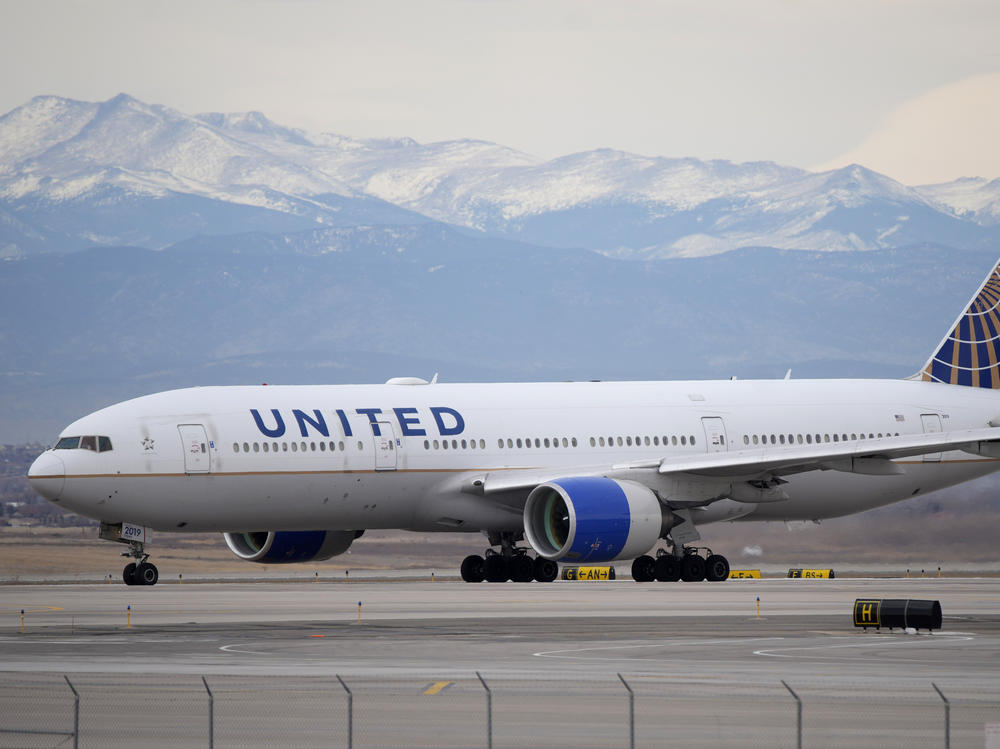 A United Airlines jetliner taxis to a runway for take off from Denver International Airport, Dec. 27, 2022.