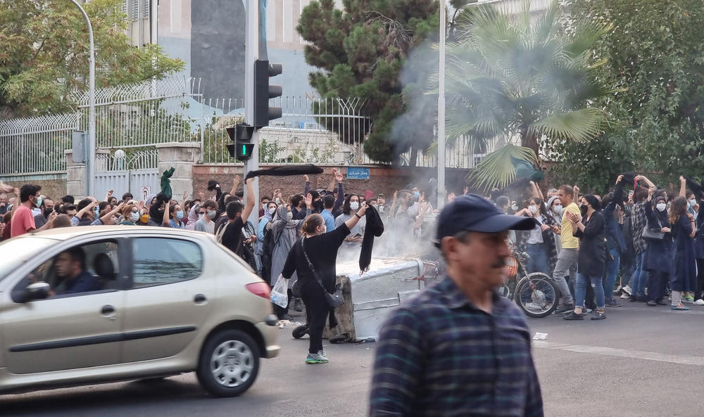People gather on the streets of Tehran on Sept. 19 last year in protest against the death of Mahsa Amini.